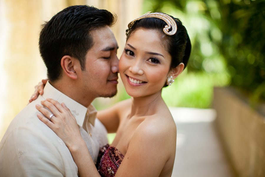 Bunn Salarzon - indonesian groom kissing his bride