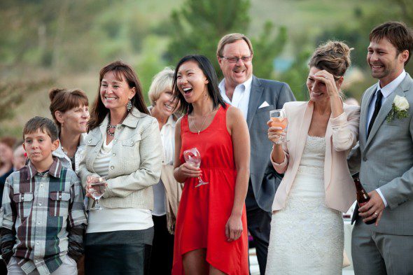 Bunn Salarzon - wedding guests laugh during toast