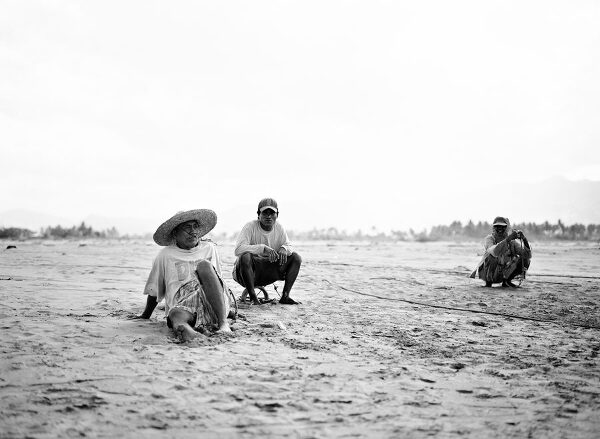 Bunn Salarzon - fishermen taking a break on the beach