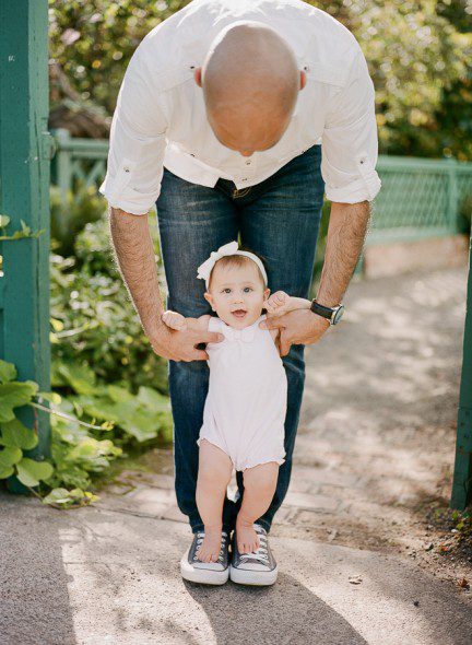 Bunn Salarzon - father teaching daughter to walk